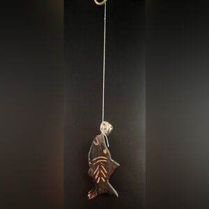 Visual Bliss Co Custom Handcrafted Wooden Fish Ornament.
Artist: T.K.E.